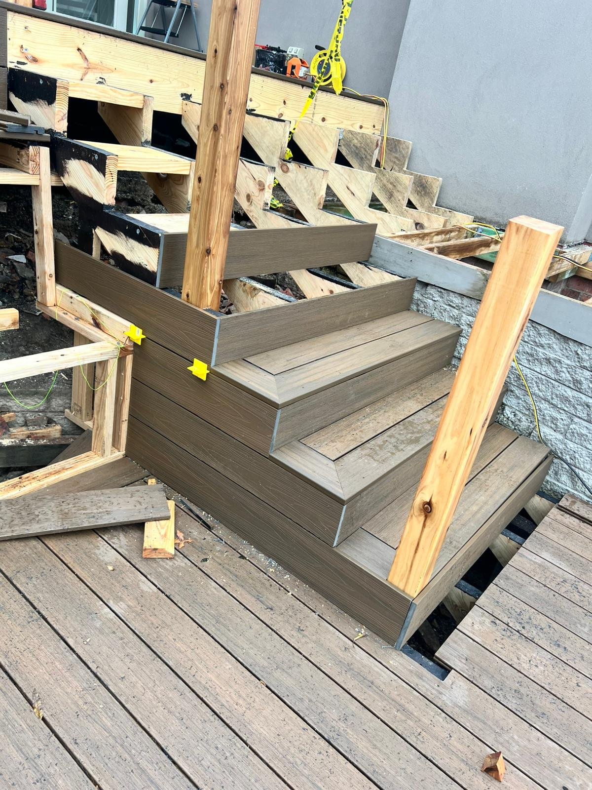 Completed timber decking with retaining wall